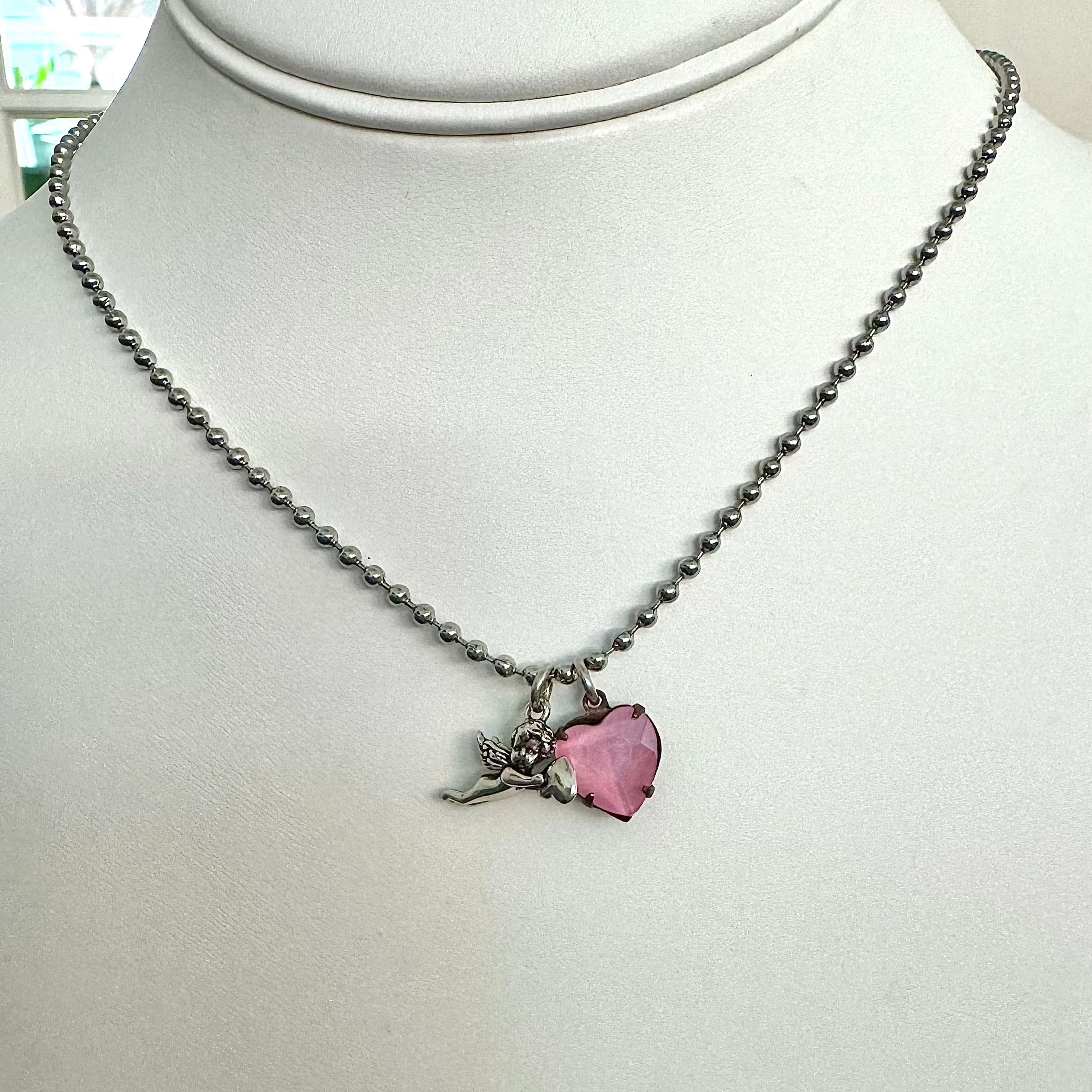 baby cupid necklace with heart charm