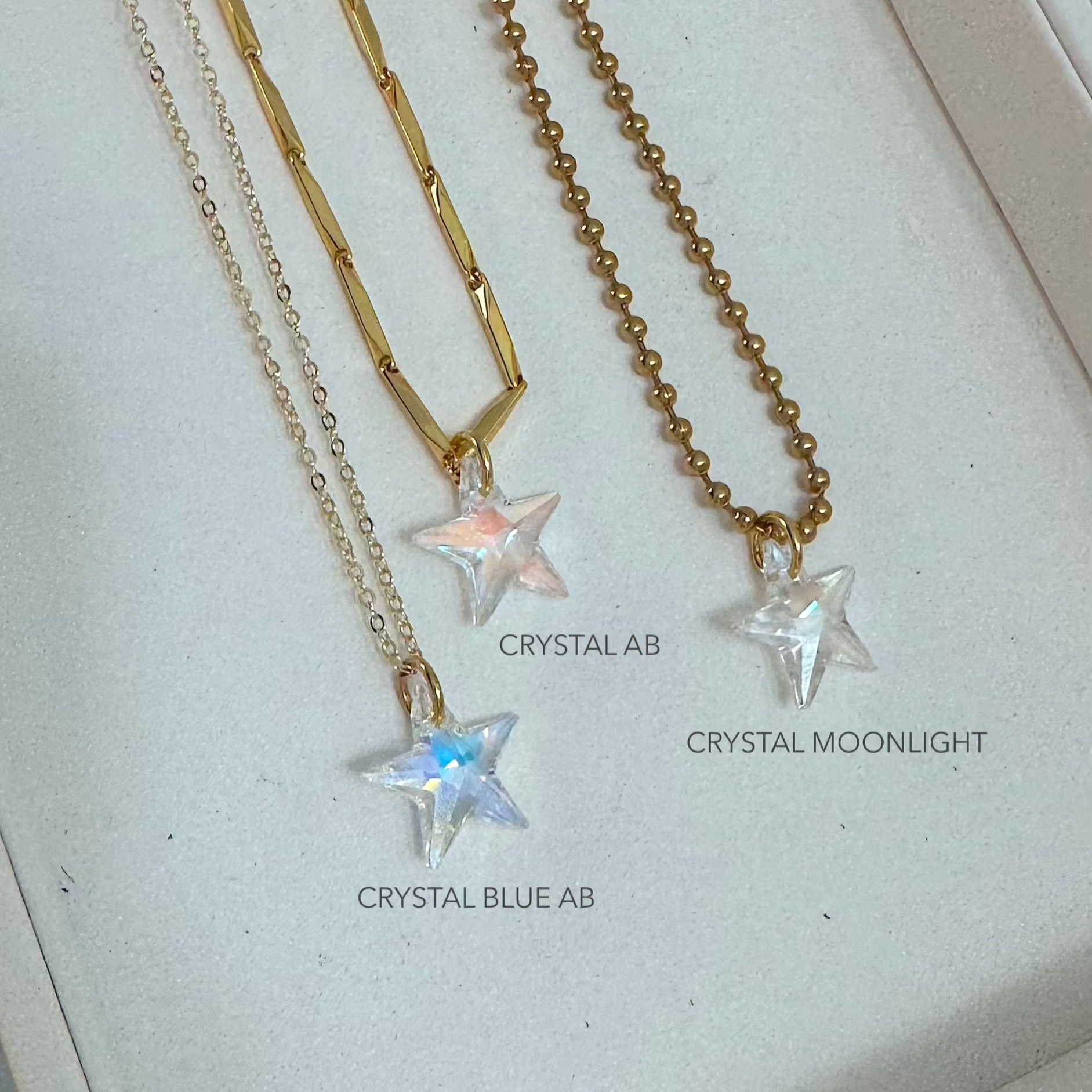 three crystal star necklaces