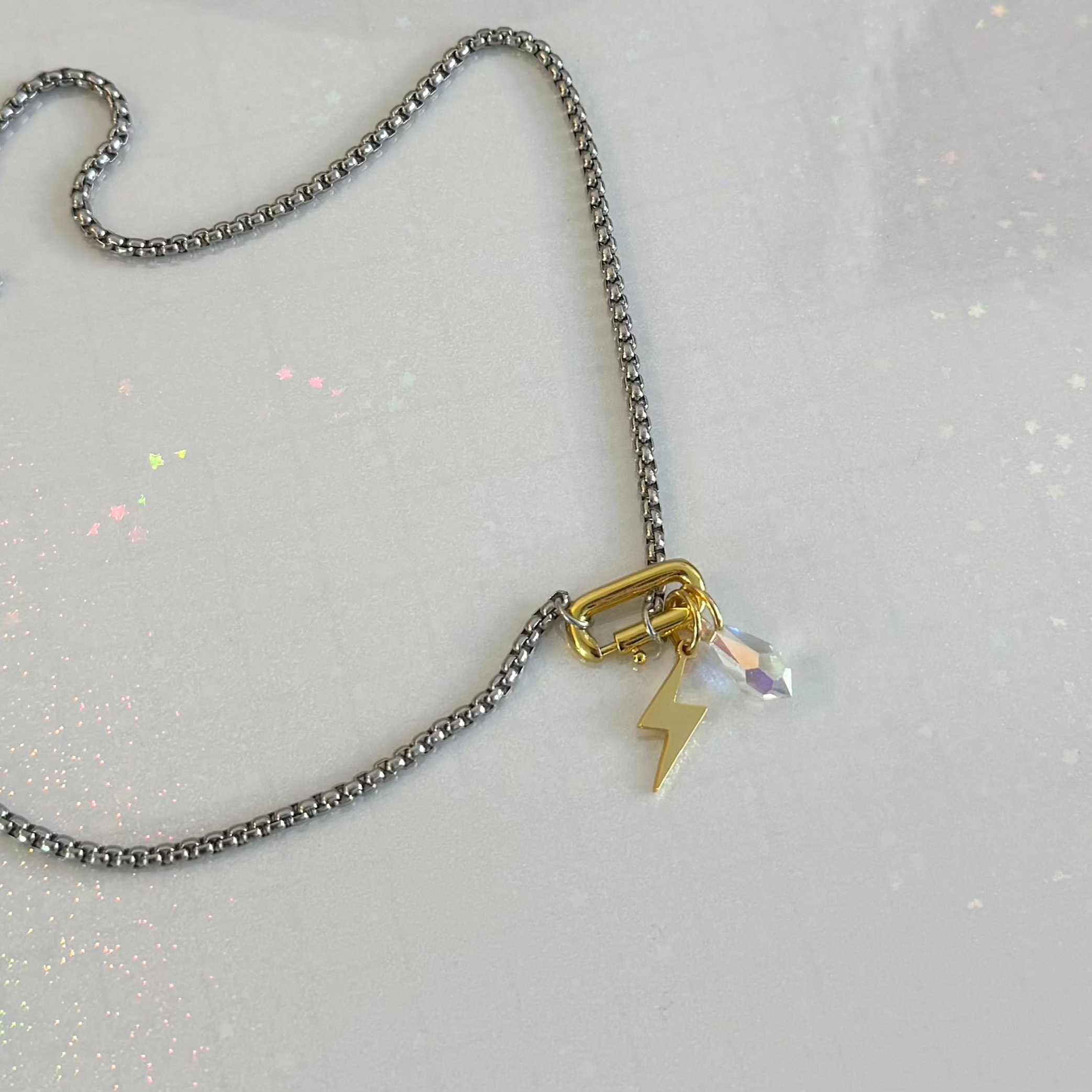 lightning bolt and crystal charms on the grunge charm necklace