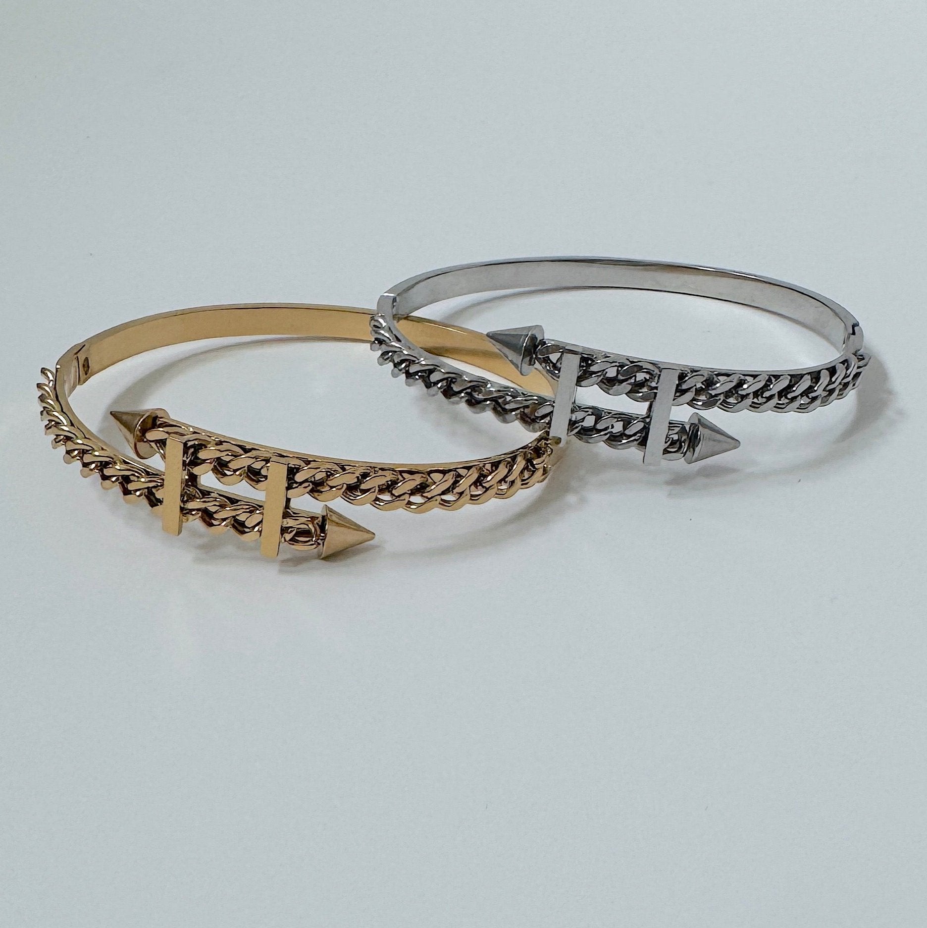 gold and silver twisted spike bangles