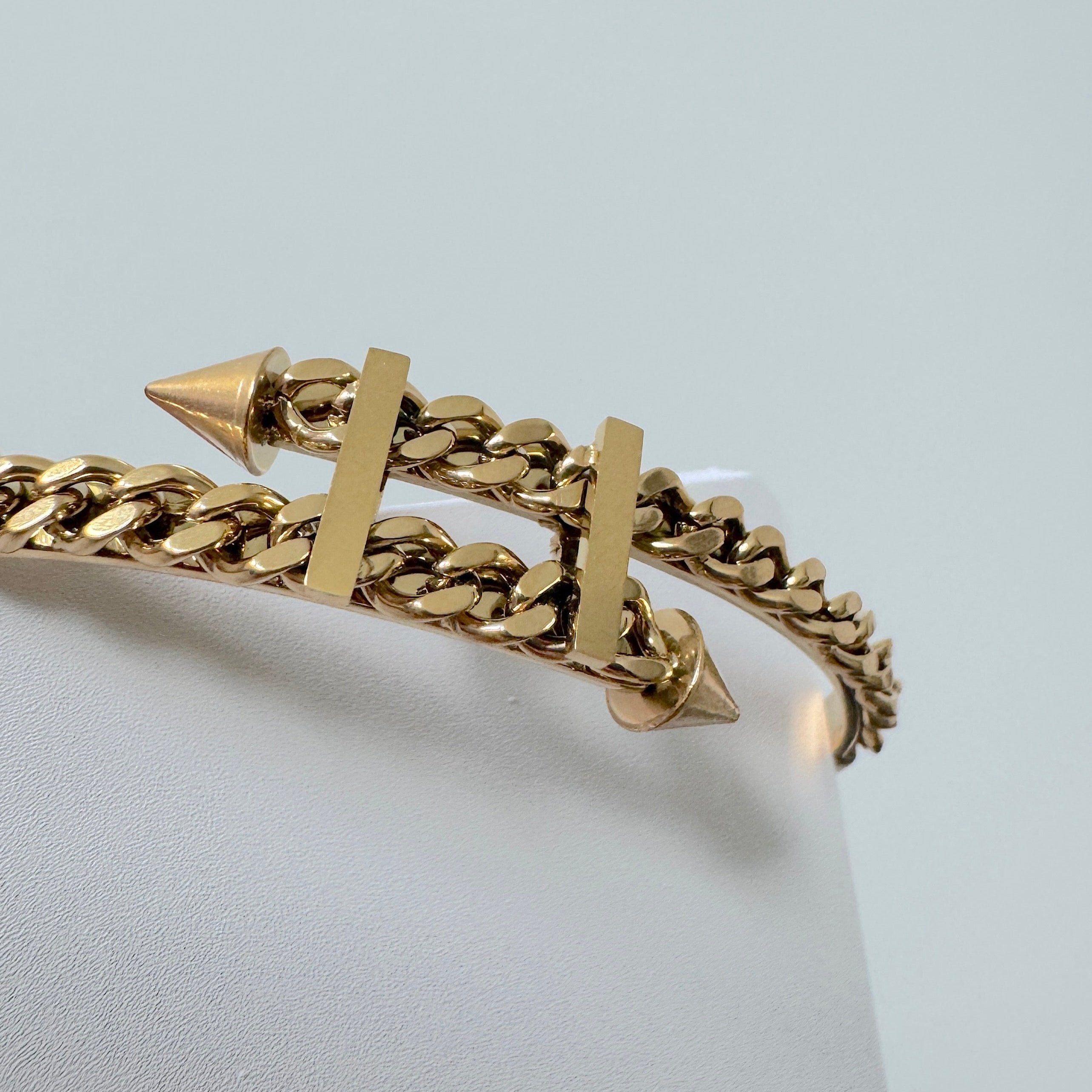 gold twisted spike bangle close up view